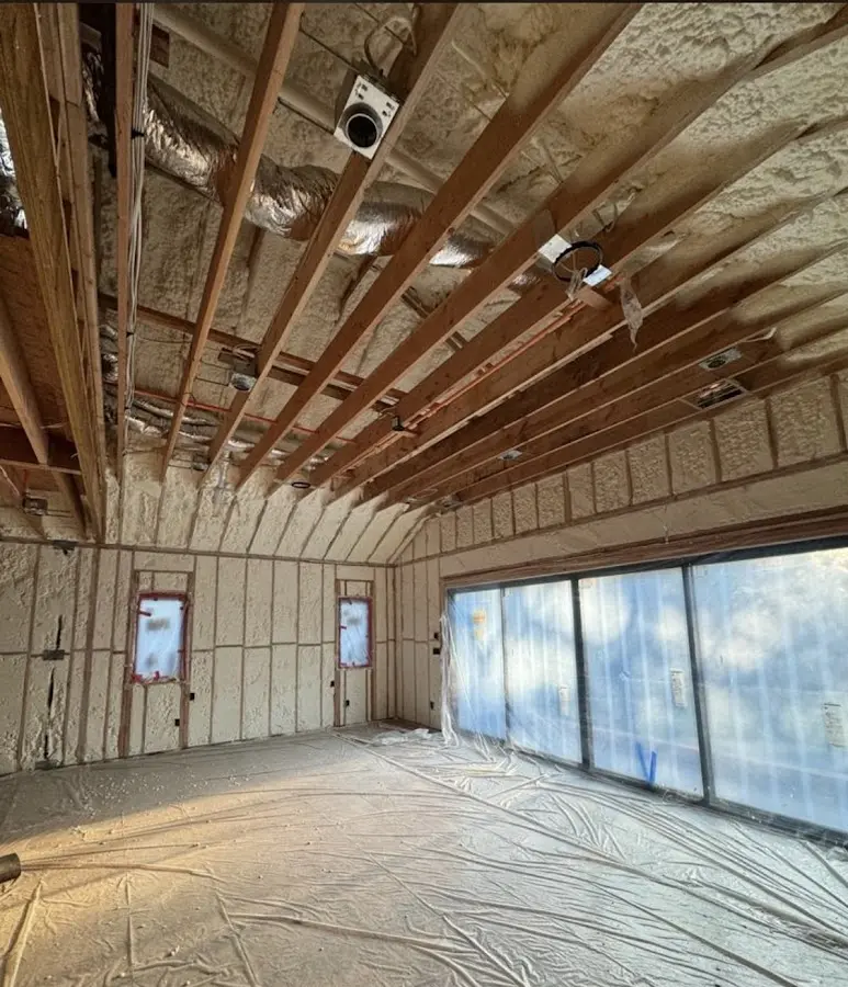Interior walls and ceiling insulated with spray foam during new construction in Lebanon